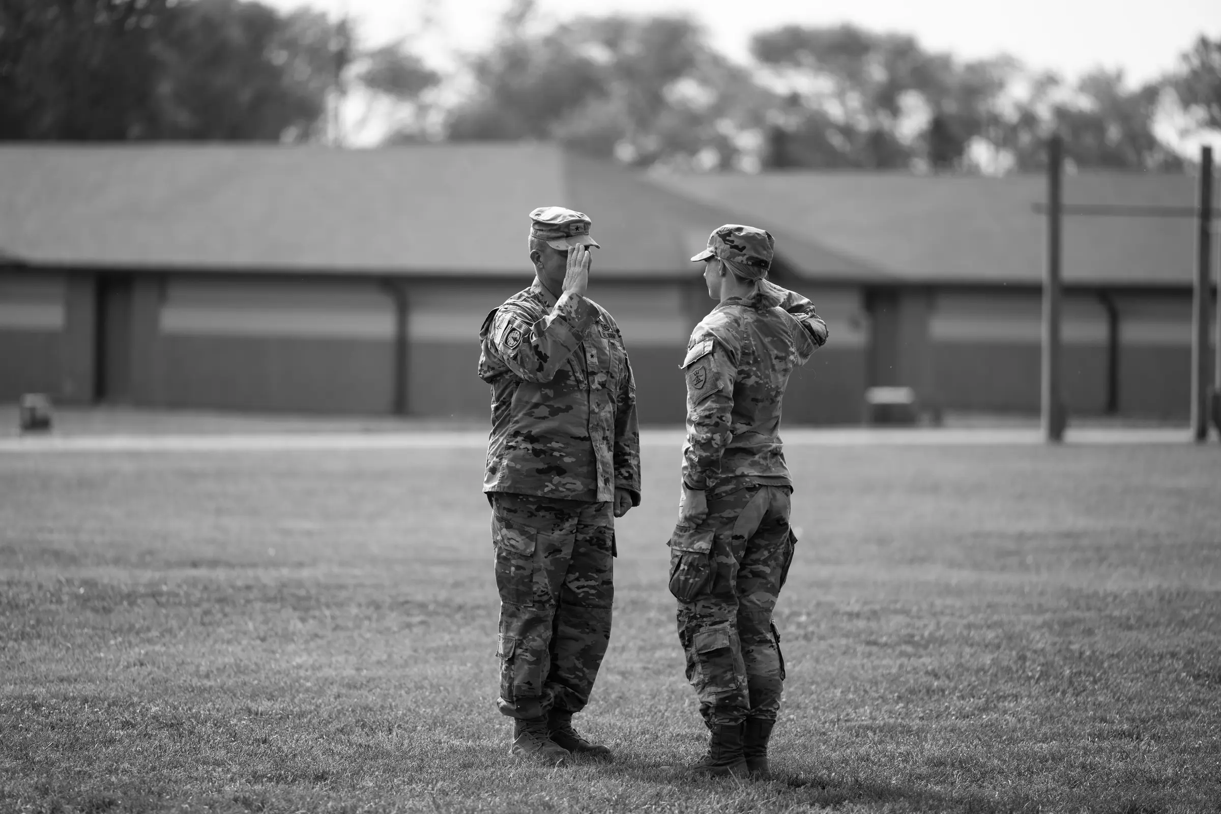 Two Army National Guard Soldiers speaking during training